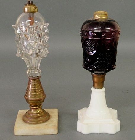 Appraisal: Amethyst glass fluid lamp with a clambroth base h and