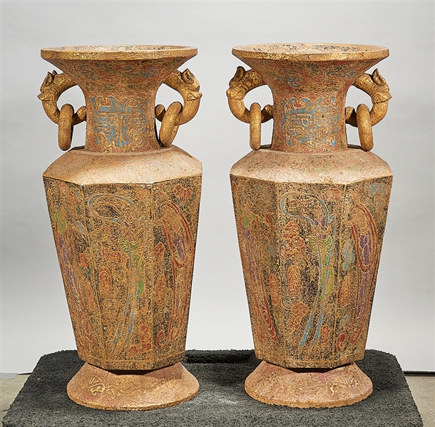 Appraisal: Pair of tall Chinese polychrome stone vases with octagonal bodies