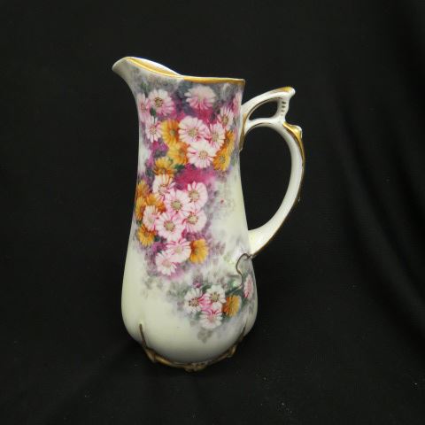 Appraisal: Handpainted Porcelain Pitcher fancy floral on satin gold trim excellent