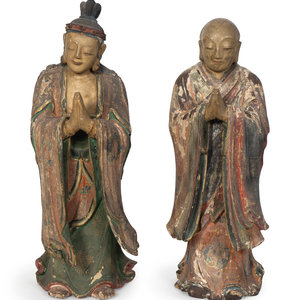 Appraisal: A Pair of Chinese Polychromed Figures of Luohan MING DYNASTY