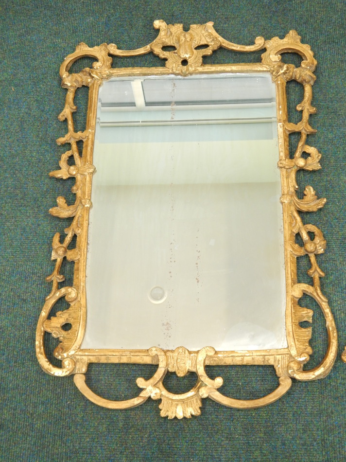 Appraisal: A George III gilt wood wall mirror the frame decorated