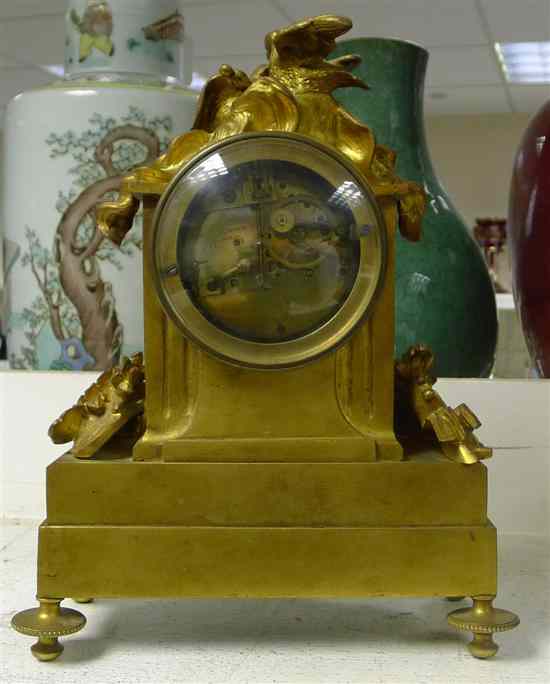 Appraisal: A late Victorian ormolu mantel clock inset with Paris porcelain