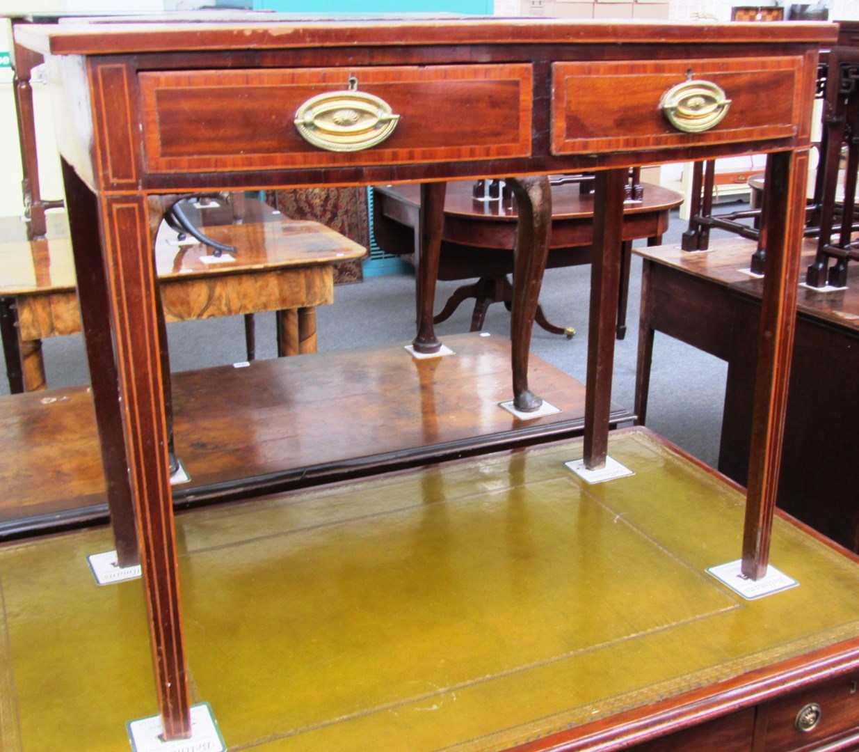 Appraisal: A George III inlaid mahogany bowfront two drawer side table