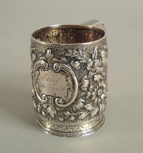 Appraisal: Tiffany Co sterling silver repousse mug inscribed Ethel de Forest