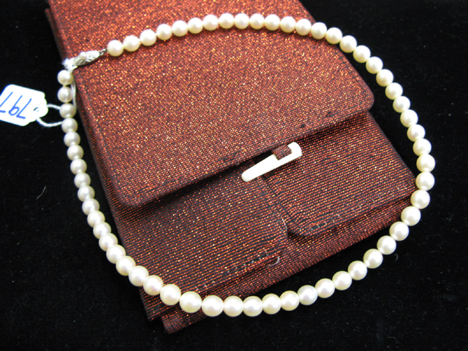 Appraisal: JAPANESE MIKIMOTO PEARL NECKLACE a inch strand of round well