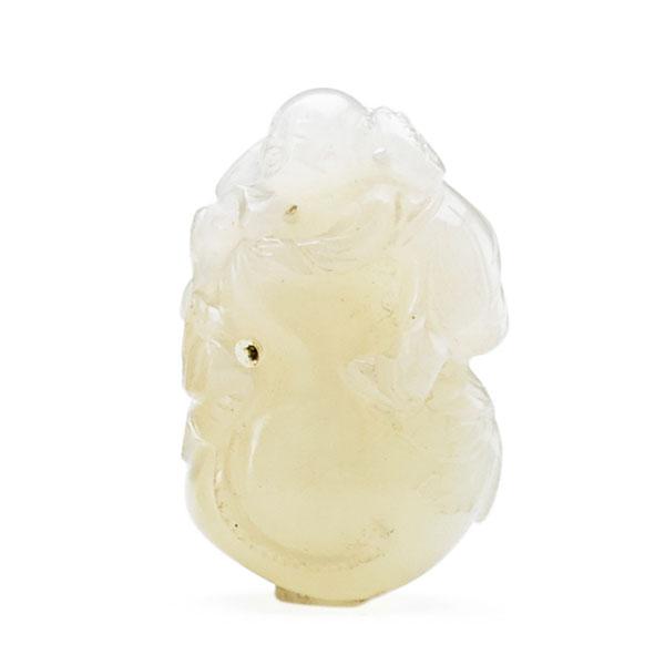 Appraisal: CHINESE WHITE JADE NETSUKE Depicting a child embracing a gourd