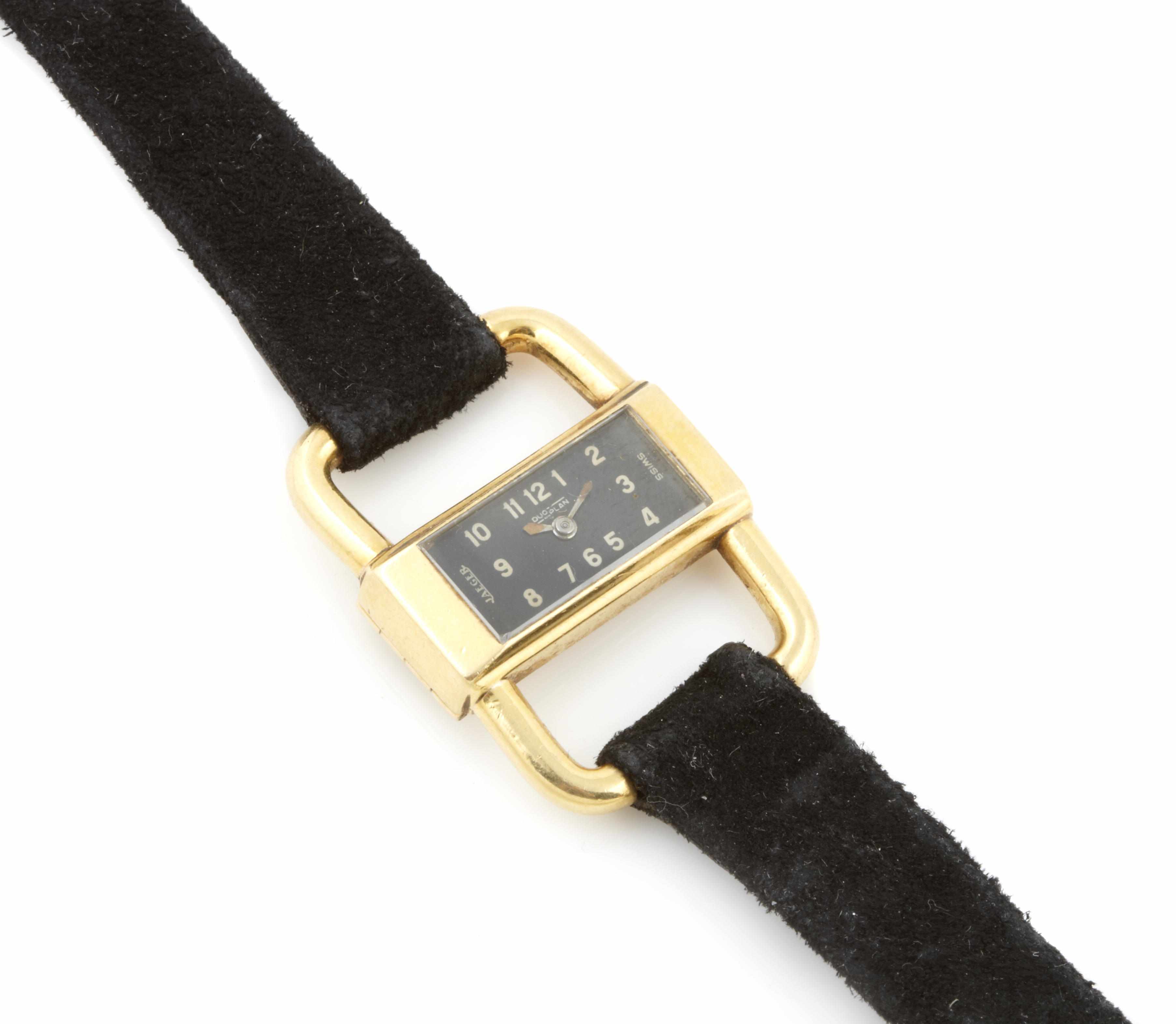 Appraisal: An k gold stir-up case and leather strapped wristwatch dial