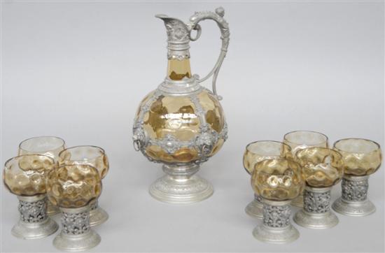 Appraisal: PEWTER MOUNTED CARAFFE Along with matching glasses H