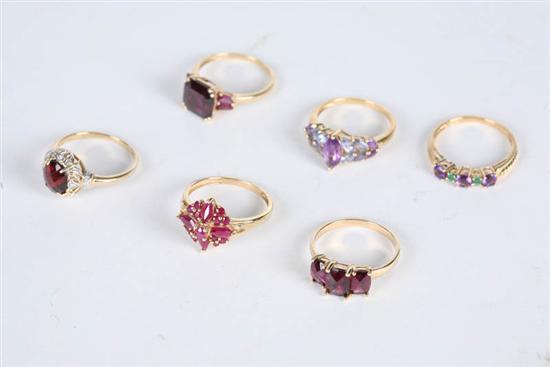 Appraisal: SIX LADIES RINGS All with various red purple and green