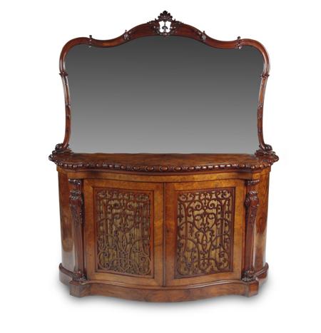 Appraisal: A mid Victorian burr walnut chiffonier the cartouche shaped mirror