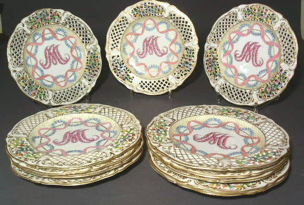 Appraisal: Twelve Dresden service plates with pierced edging and flowers dia