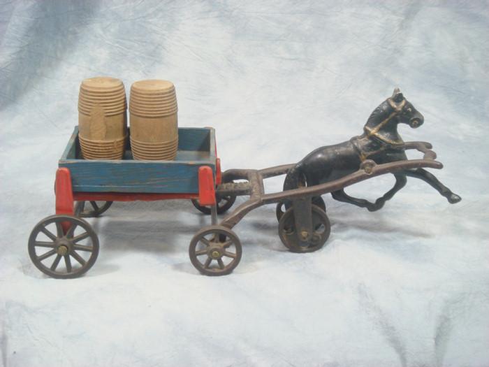 Appraisal: Cast iron toy horse drawn blue wooden cart wooden barrel