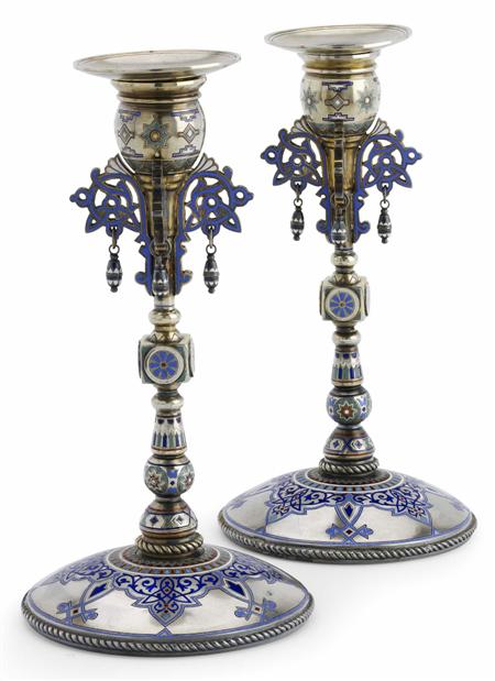 Appraisal: A pair of Russian silver-gilt and champlev enamel candlesticks Pavel