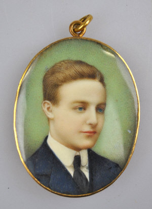 Appraisal: A very fine double-sided portrait miniature pair of an Edwardian