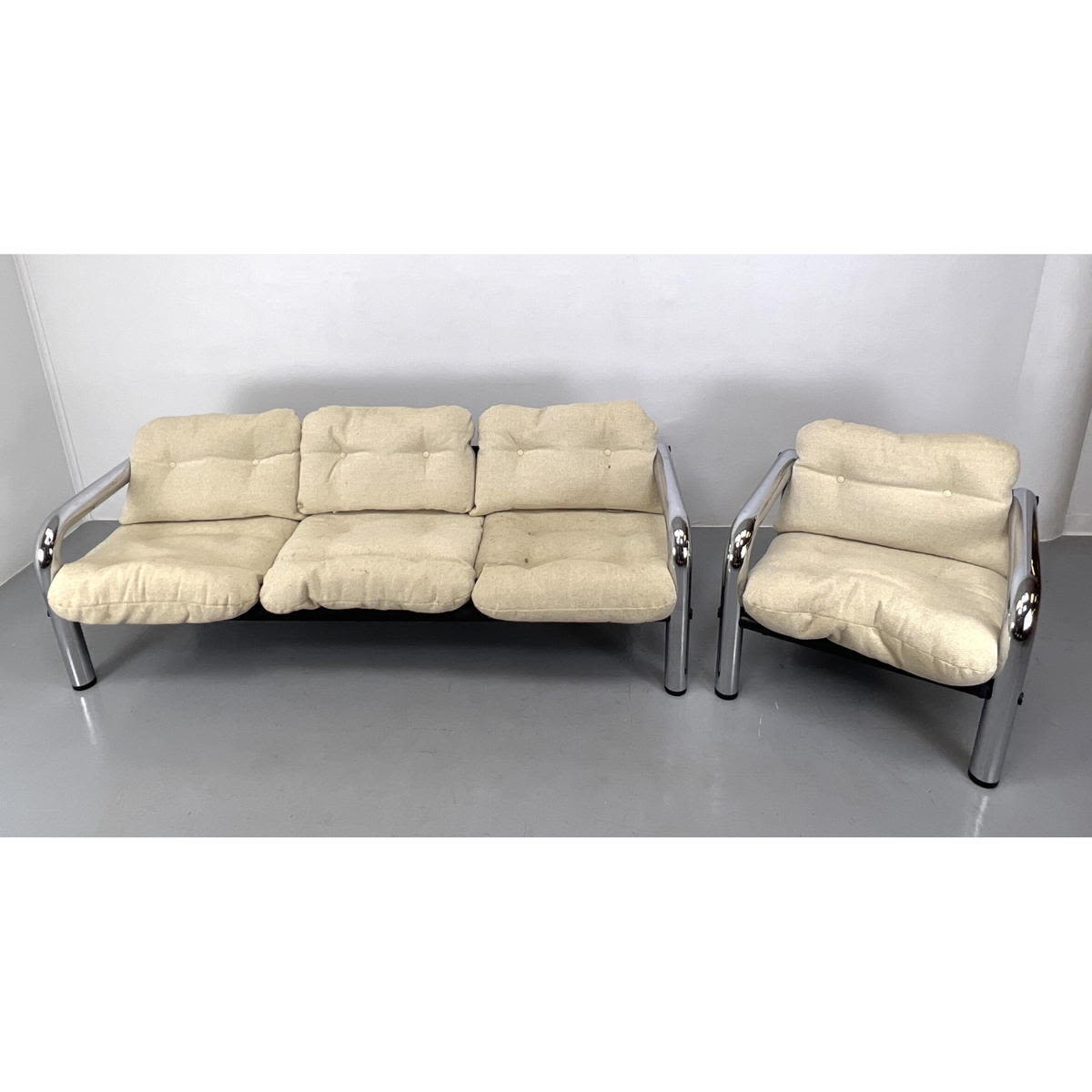 Appraisal: Mid Century Modern Thick Chrome Tube Sofa and Lounge Chair