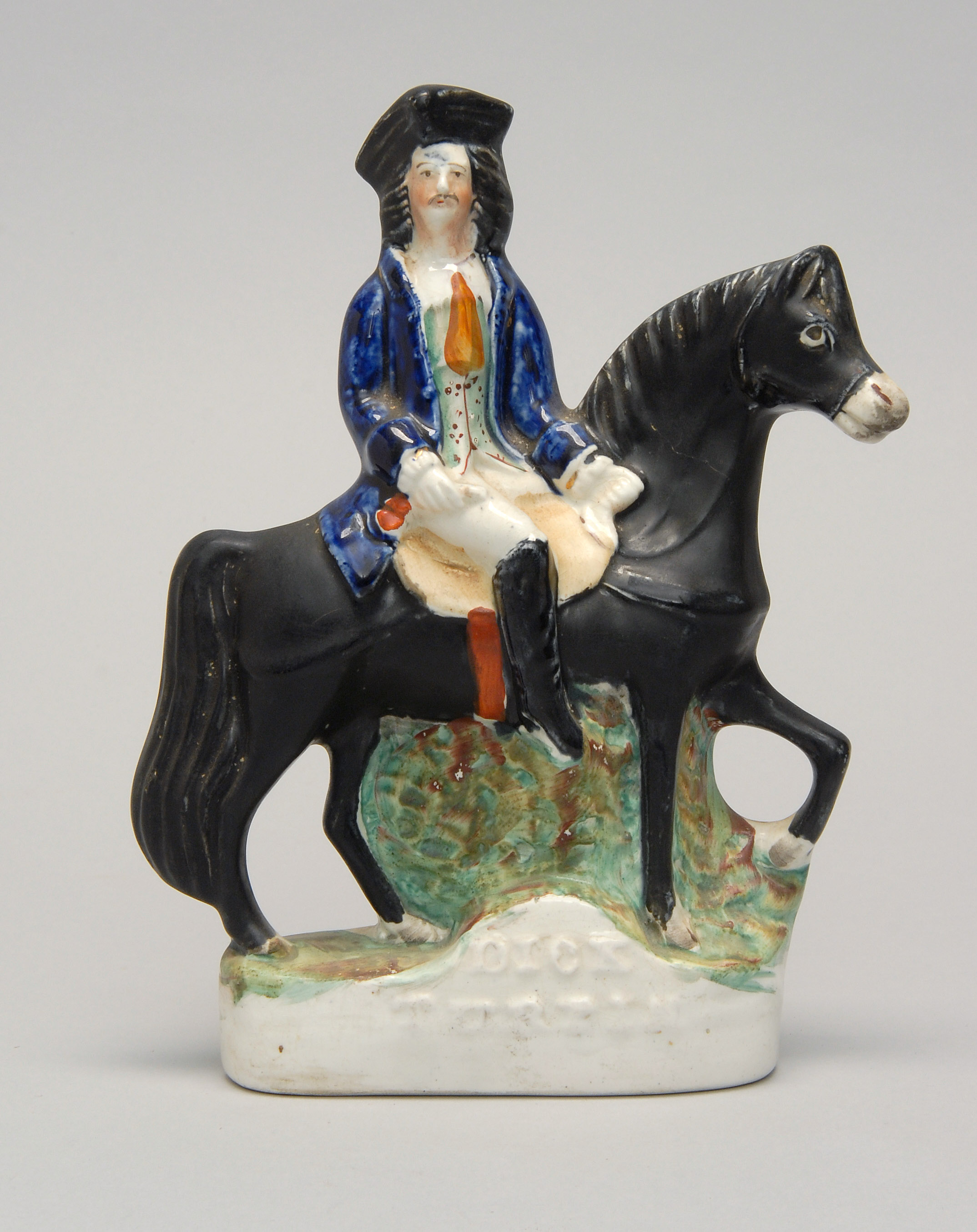 Appraisal: MID- TH CENTURY STAFFORDSHIRE POTTERY FIGURE OF DICK TURPIN riding