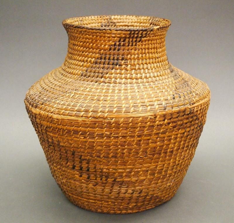 Appraisal: Pima coiled jar An early th century Pima coiled jar