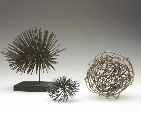 Appraisal: STYLE OF HARRY BERTOIA Three welded and patinated steel sculptures