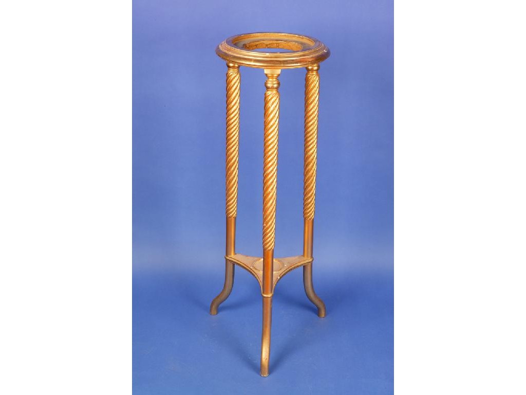 Appraisal: A LATE GEORGE III GILTWOOD TORCHERE with a dished circular