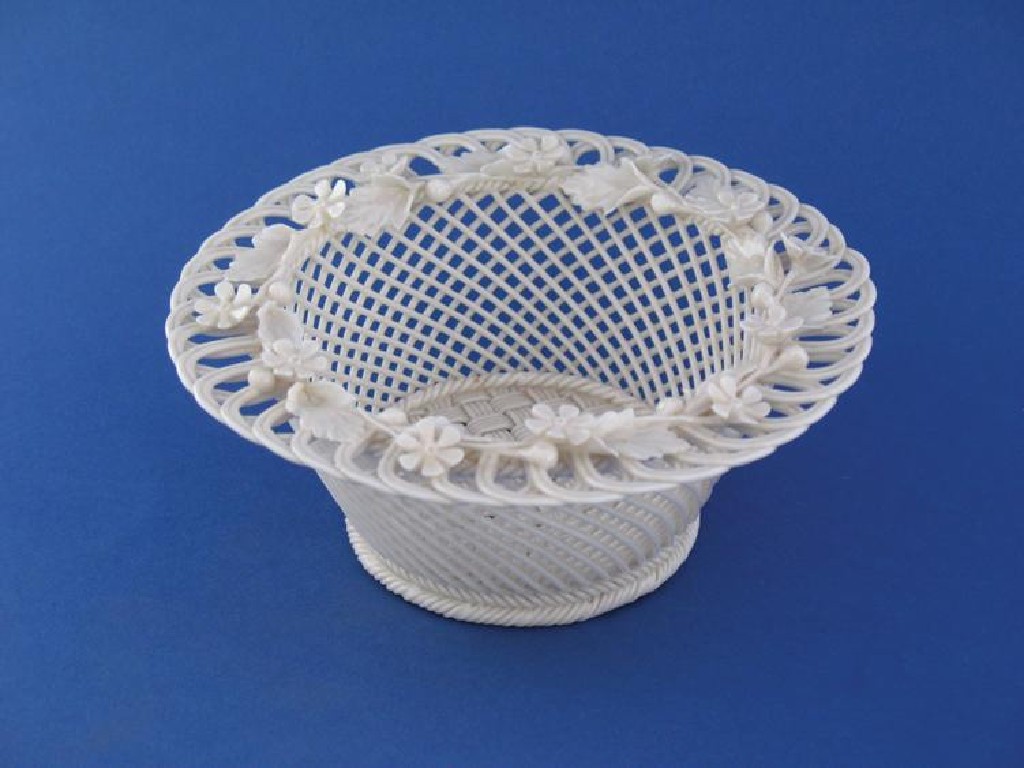 Appraisal: A TH CENTURY BELLEEK DISH of basketwork form the looping