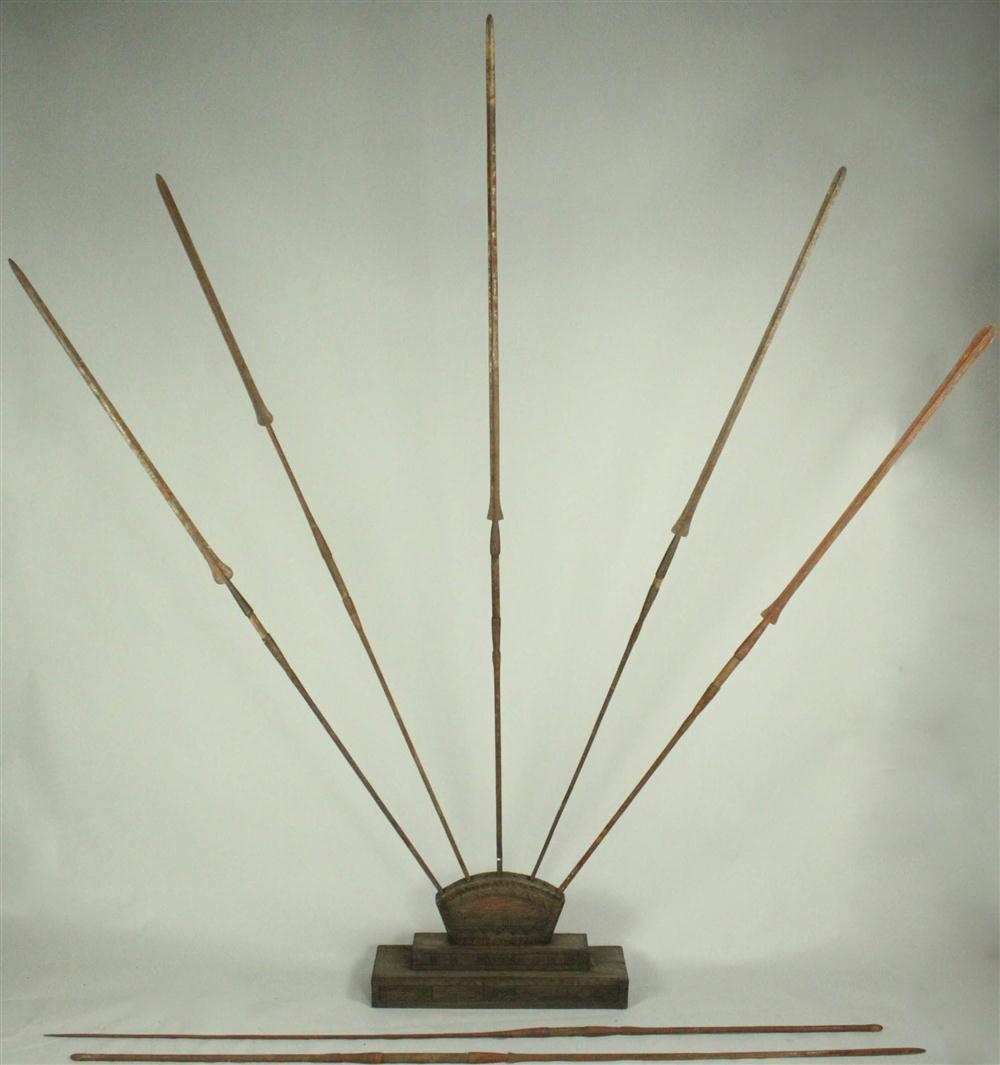 Appraisal: EAST AFRICAN HARDWOOD STEPPED NINE HOLE SPEAR HOLDER WITH GROUP