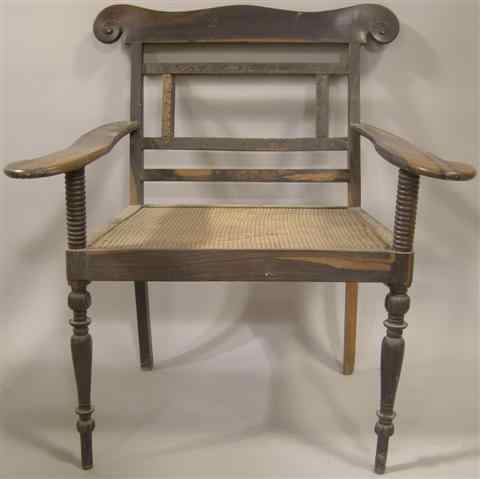 Appraisal: ANGLO-INDIAN CANED CALAMANDER ARMCHAIR th century the shaped cresting rail