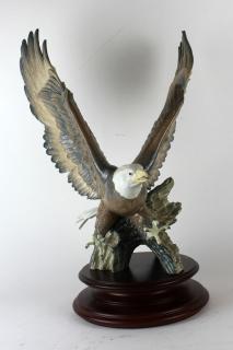 Appraisal: Lladro porcelian Justice Eagle on wooden base Statue h x