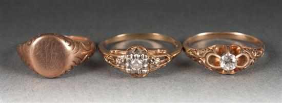 Appraisal: Three gold and diamond rings early th century including diamond