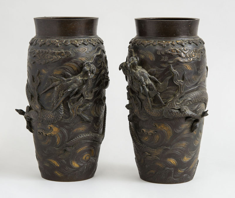 Appraisal: PAIR OF JAPANESE BRONZE VASES Unmarked each ovoid bowl relief