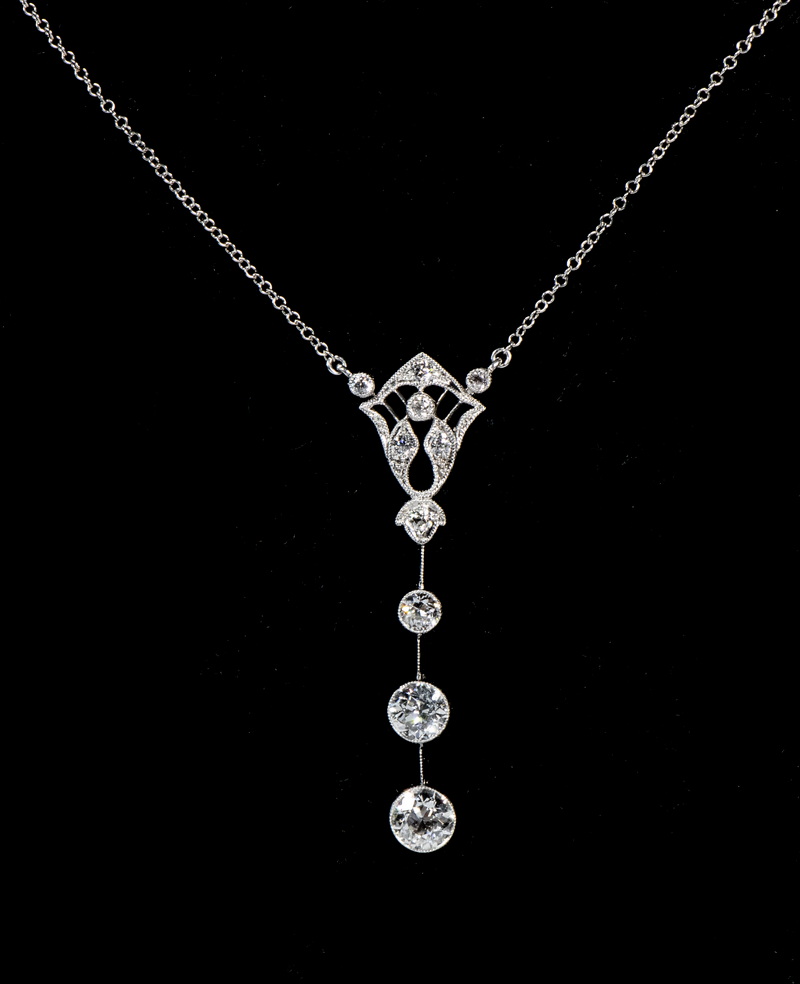 Appraisal: EDWARDIAN PLATINUM AND DIAMOND PENDANT FORM NECKLACE Antique pendant with