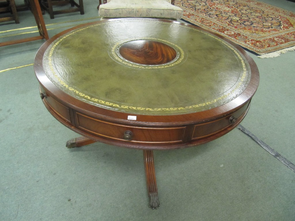 Appraisal: Reproduction drum style revolving table with leather top