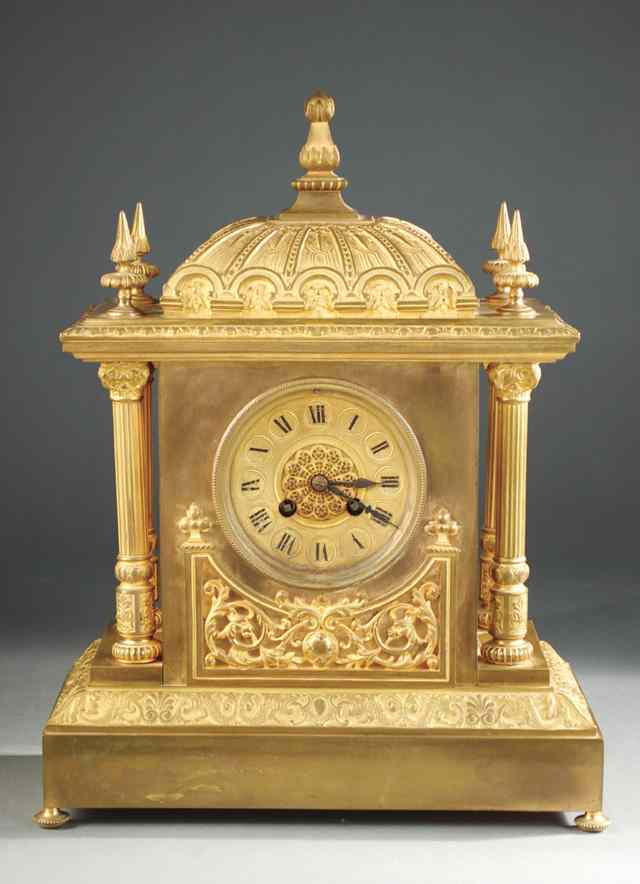 Appraisal: FRENCH GILT BRONZE SHELF CLOCK Centered with a time and