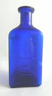 Appraisal: Poison bottle Poison- cobalt triangle side Owl with one wing