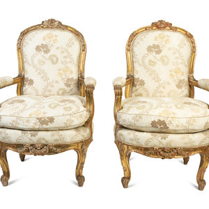 Appraisal: A Pair of Louis XV Style Giltwood Fauteuils TH CENTURY