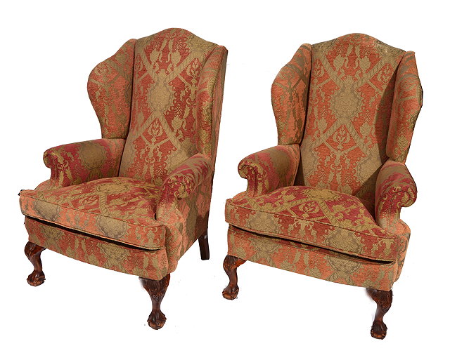 Appraisal: A PAIR OF GEORGE III STYLE WING BACK ARMCHAIRS by