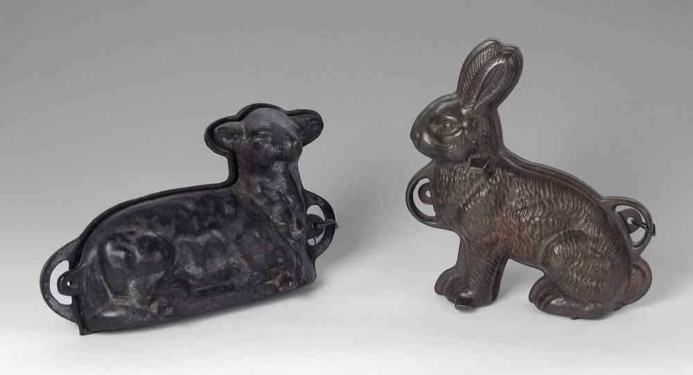 Appraisal: GRISWOLD CAST IRON RABBIT AND LAMB MOLDS Two part molds