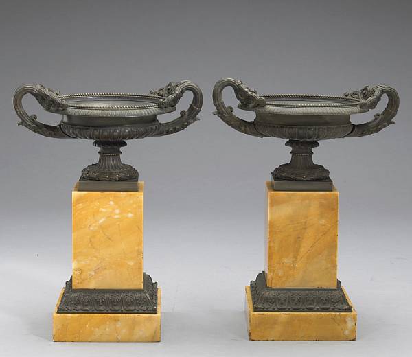 Appraisal: A pair of Charles X patinated bronze and Siena marble