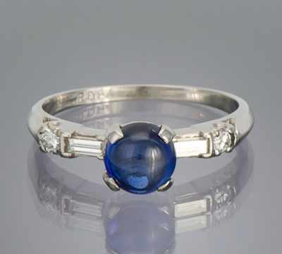 Appraisal: A Ladies' Sapphire Cabochon and Diamond Ring Platinum ring set