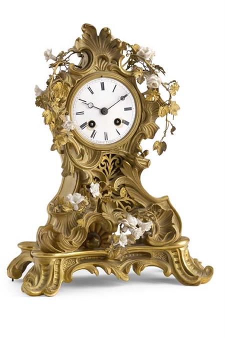 Appraisal: A th Century gilt bronze and porcelain mounted mantel clock