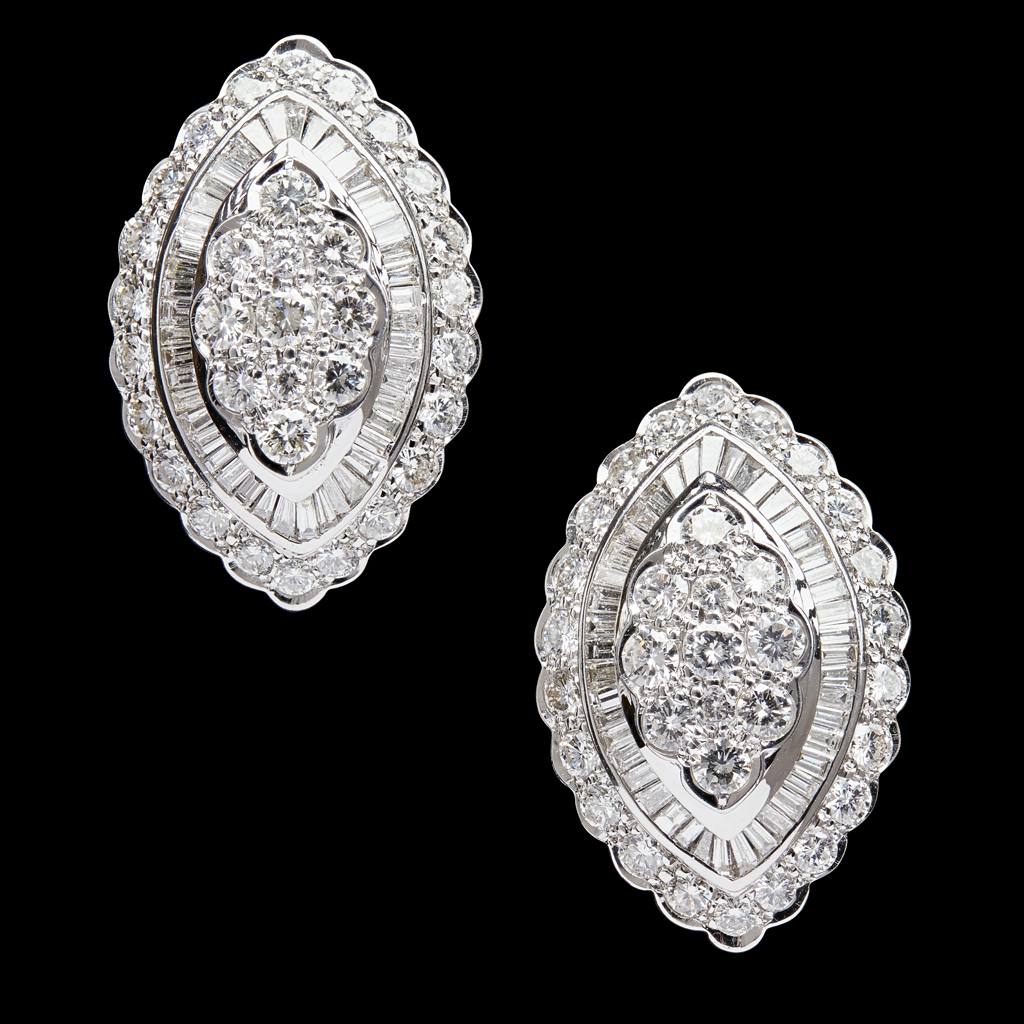 Appraisal: A pair of diamond set earringseach of navette outline the