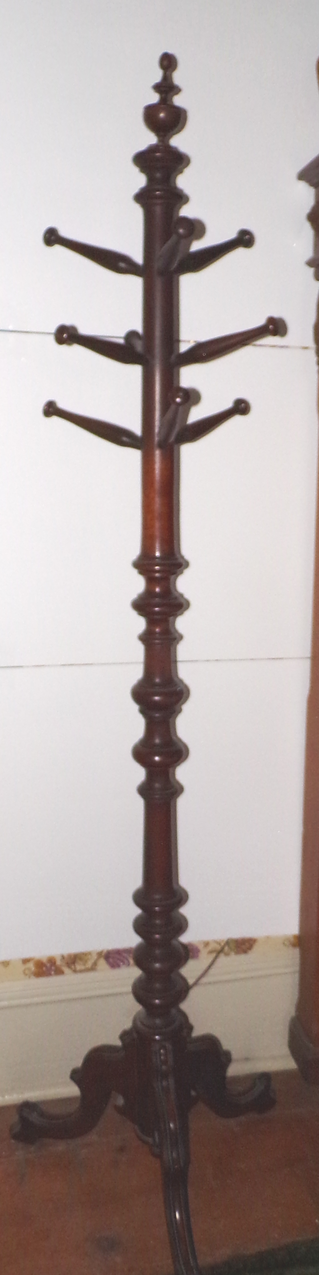 Appraisal: Walnut coat rack turned column tripod base ''h