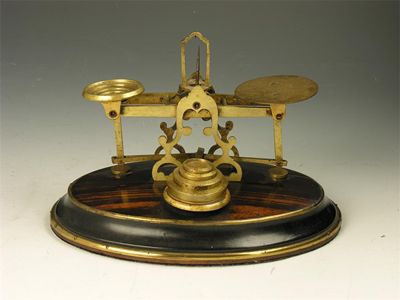 Appraisal: An early Victorian coromandel and brass set of scales with