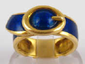 Appraisal: A French hallmarked carat gold and blue enamel buckle ring