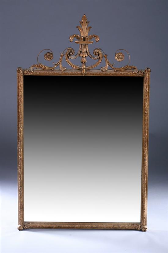 Appraisal: CONTINENTAL ROCOCO STYLE GILT WOOD MIRROR Early th century Scrolling-foliate