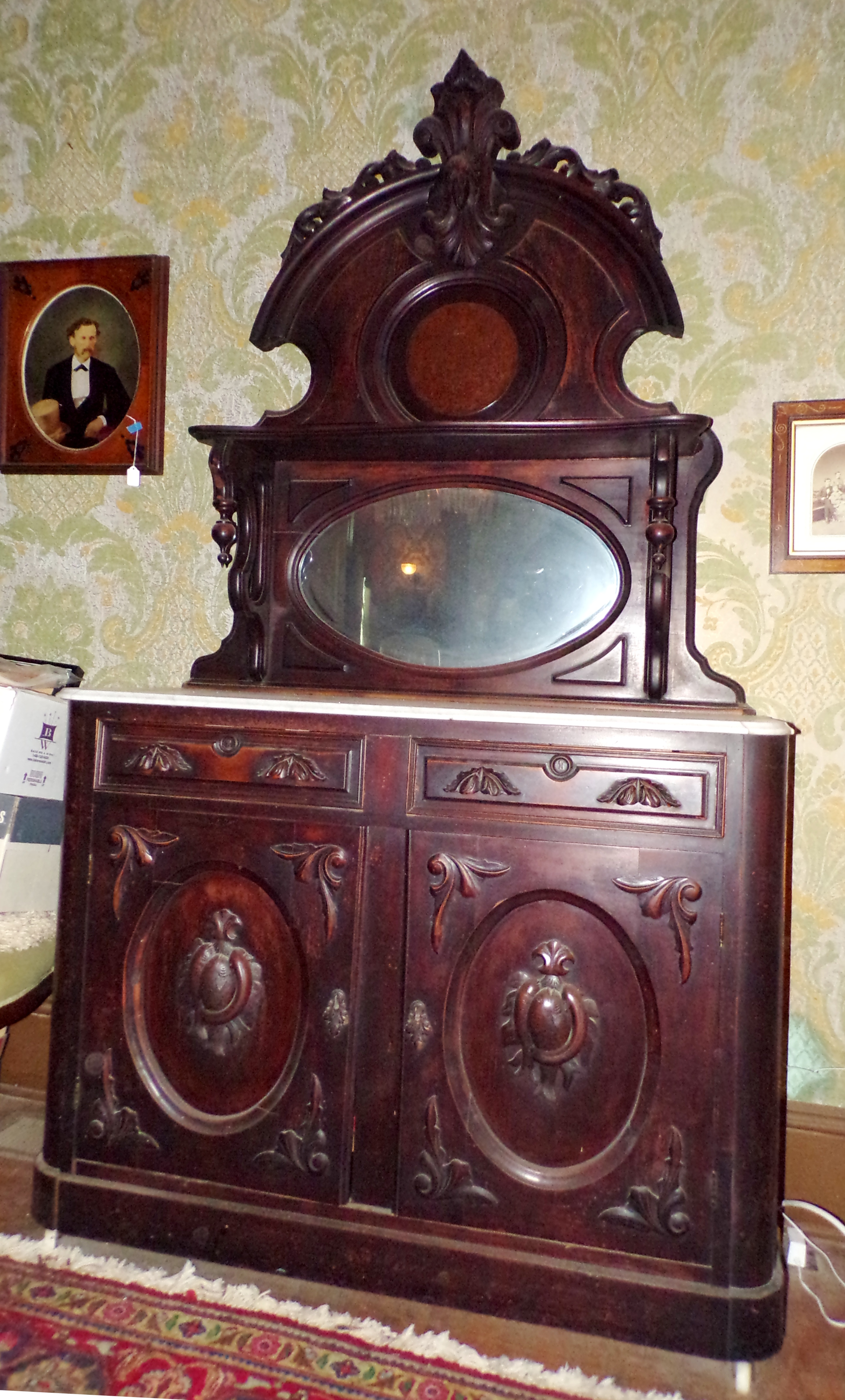 Appraisal: Victorian walnut marble top sideboard- with carved crest and raised