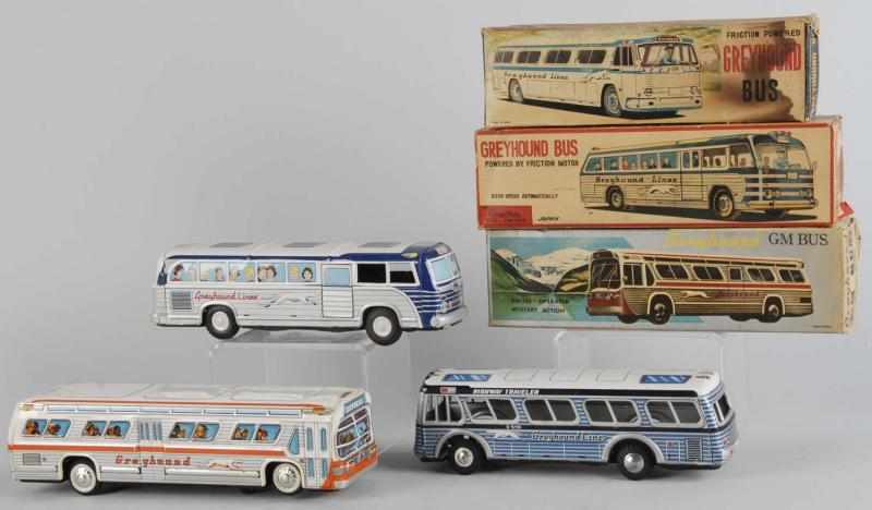 Appraisal: Lot of Tin Litho Greyhound Bus Toys Description Japanese Working