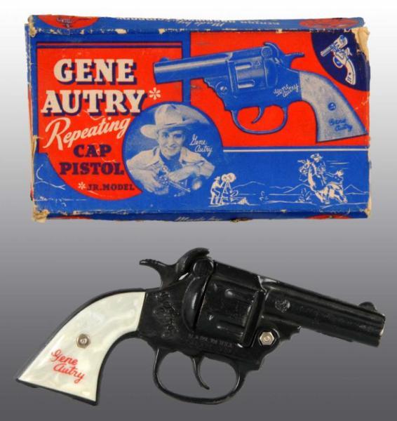 Appraisal: Cast Iron Kenton Gene Autry Repeating Toy Cap Gun Description