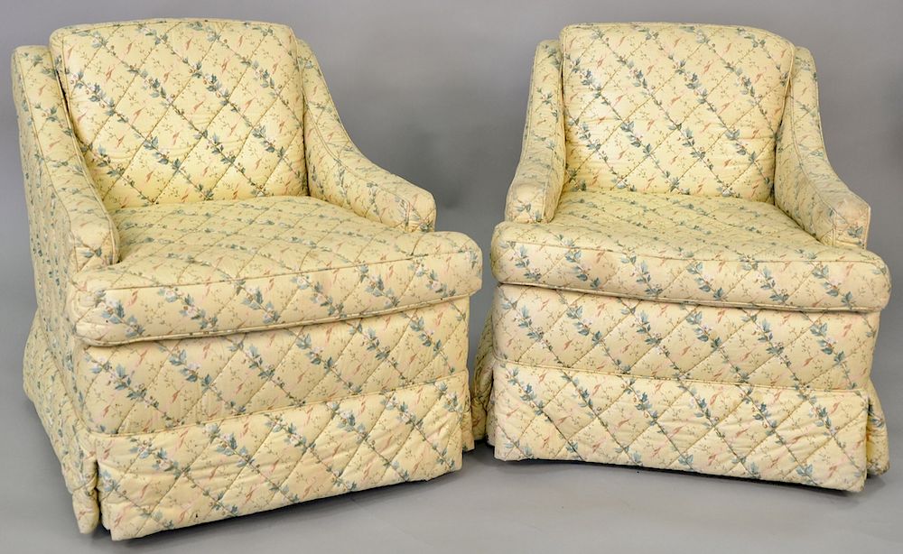 Appraisal: Pair of contemporary upholstered swivelling club chairs Pair of contemporary