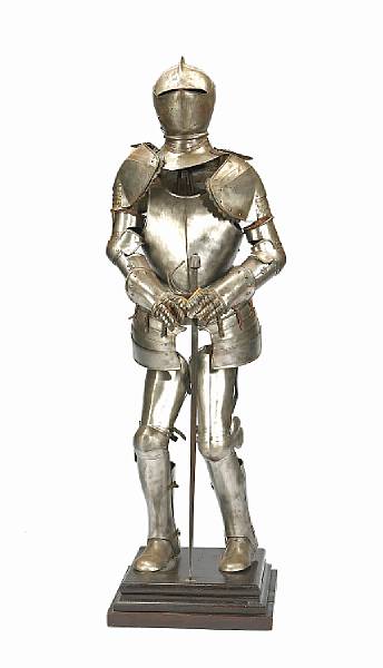 Appraisal: An English polished metal suit of armor on stand mid