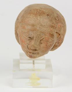 Appraisal: Egyptian clay head on stand Egyptian clay head on stand